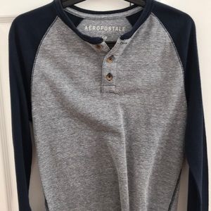 Grey w/navy blue sleeves.